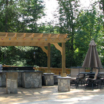 Stamped concrete outdoor kitchen designs by Greystone Masonry