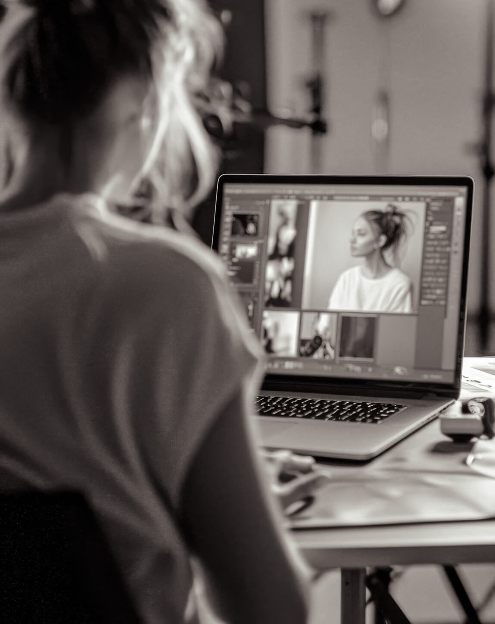Post production film editing on laptop.