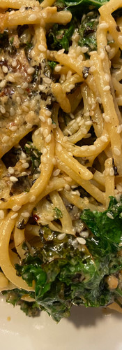 tahini pasta with kale and sesame seeds