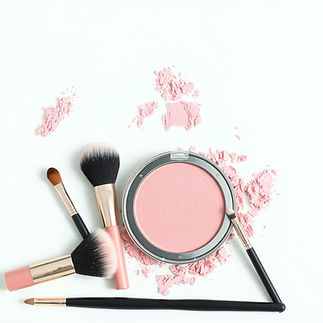 powdered pink makeup with makeup brushes.jpg