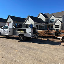 Mobile welding truck with crane performing on-site industrial metal repair.