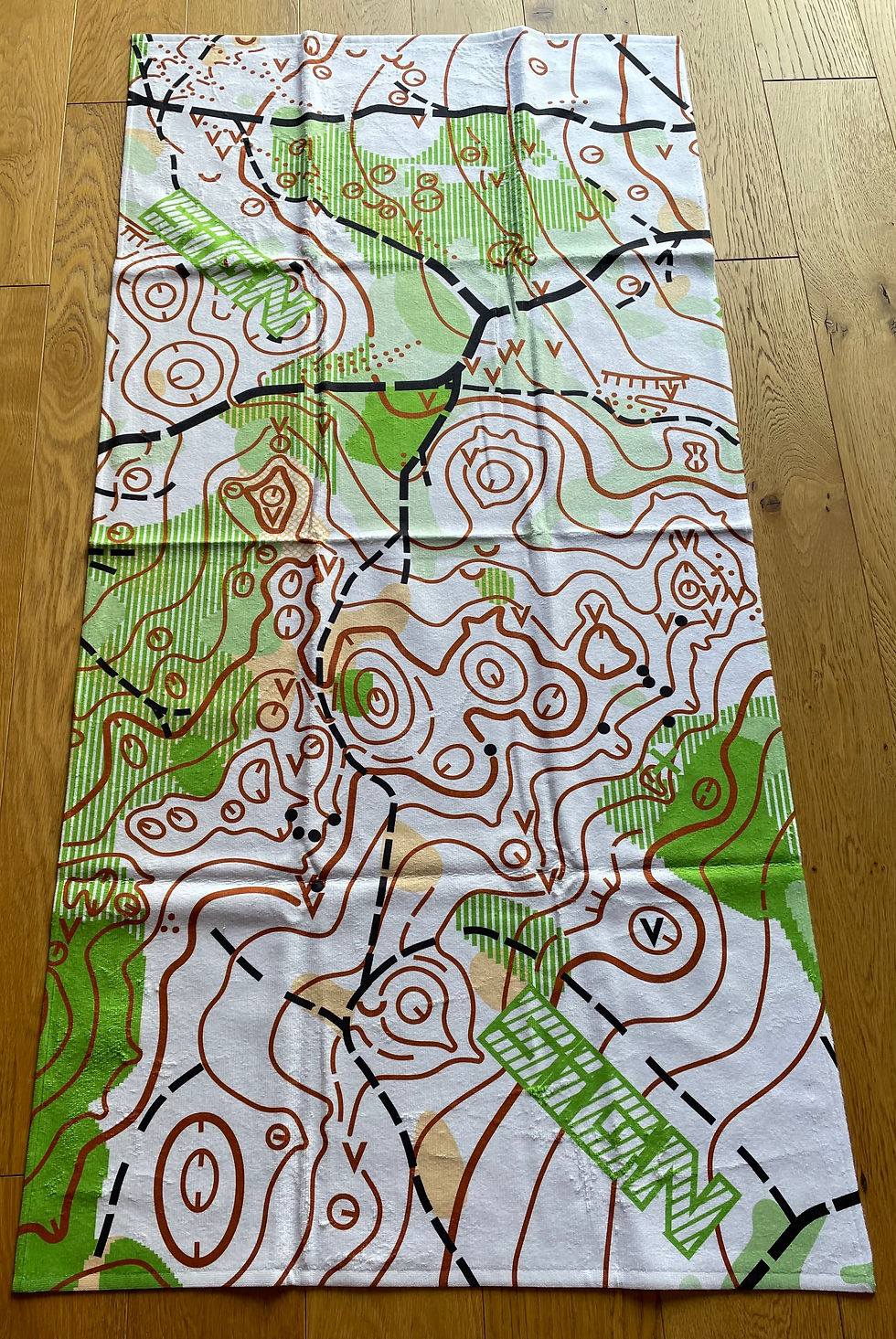 Serviette SIGN - avec carte d'orientation