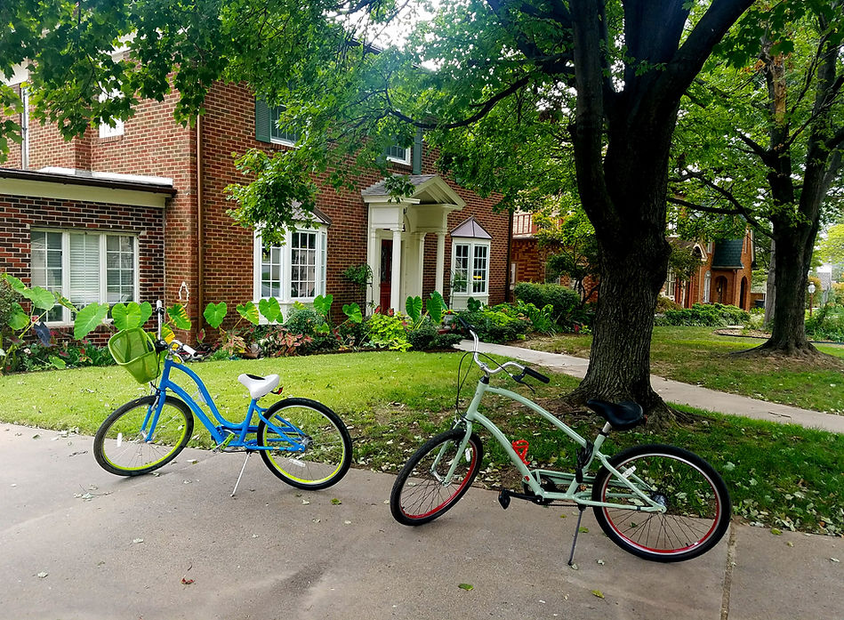 New England Home with Two Bikes in the Front Yard