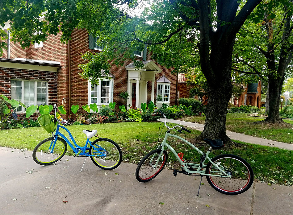 New England Home with Two Bikes in the Front Yard