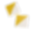 Two folded yellow-and-white patterned quilt blocks on a black background.