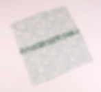 two floral fabric sewn together at the centre, dark green with white flowers