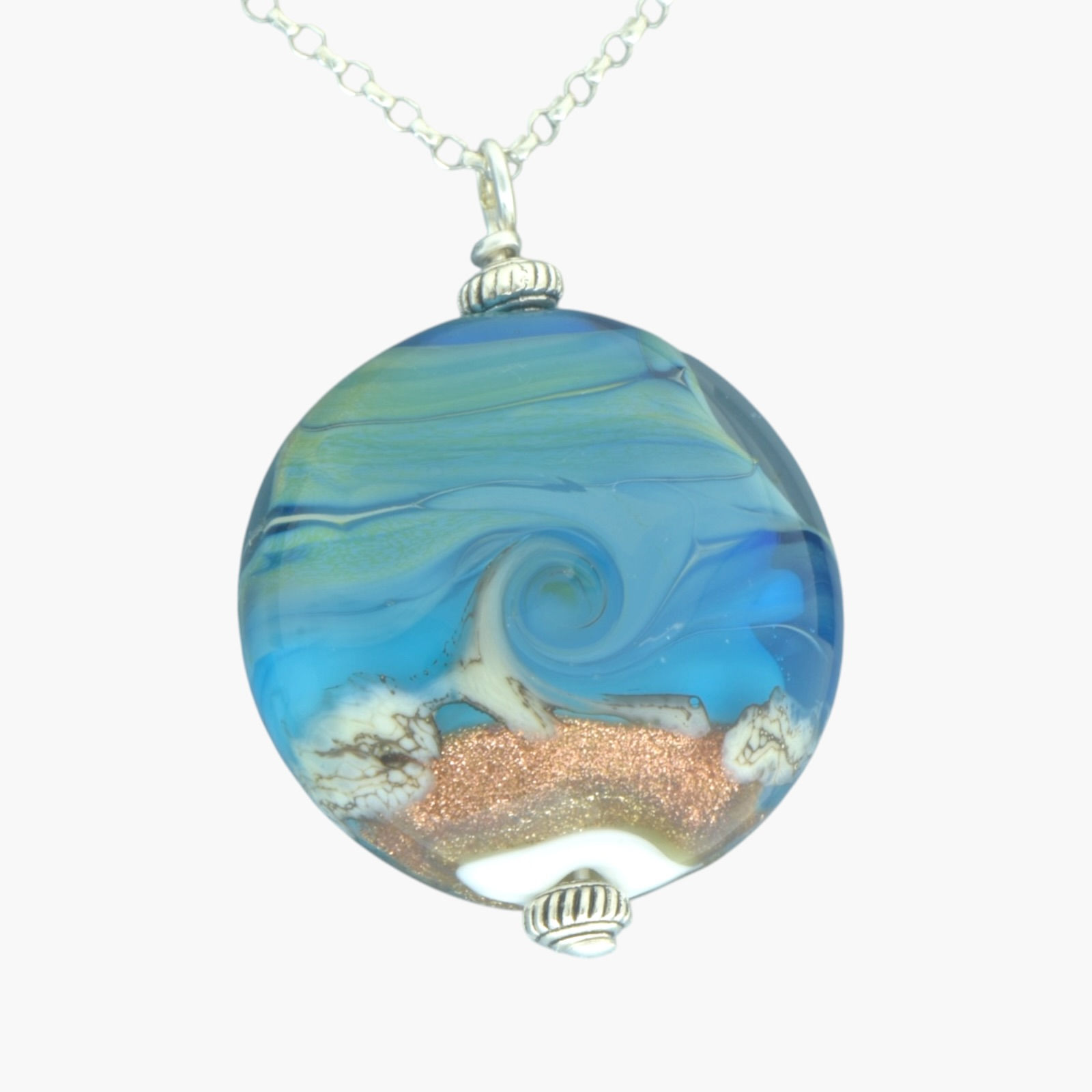 Blue and gold sea inspired pendant on silver chain
