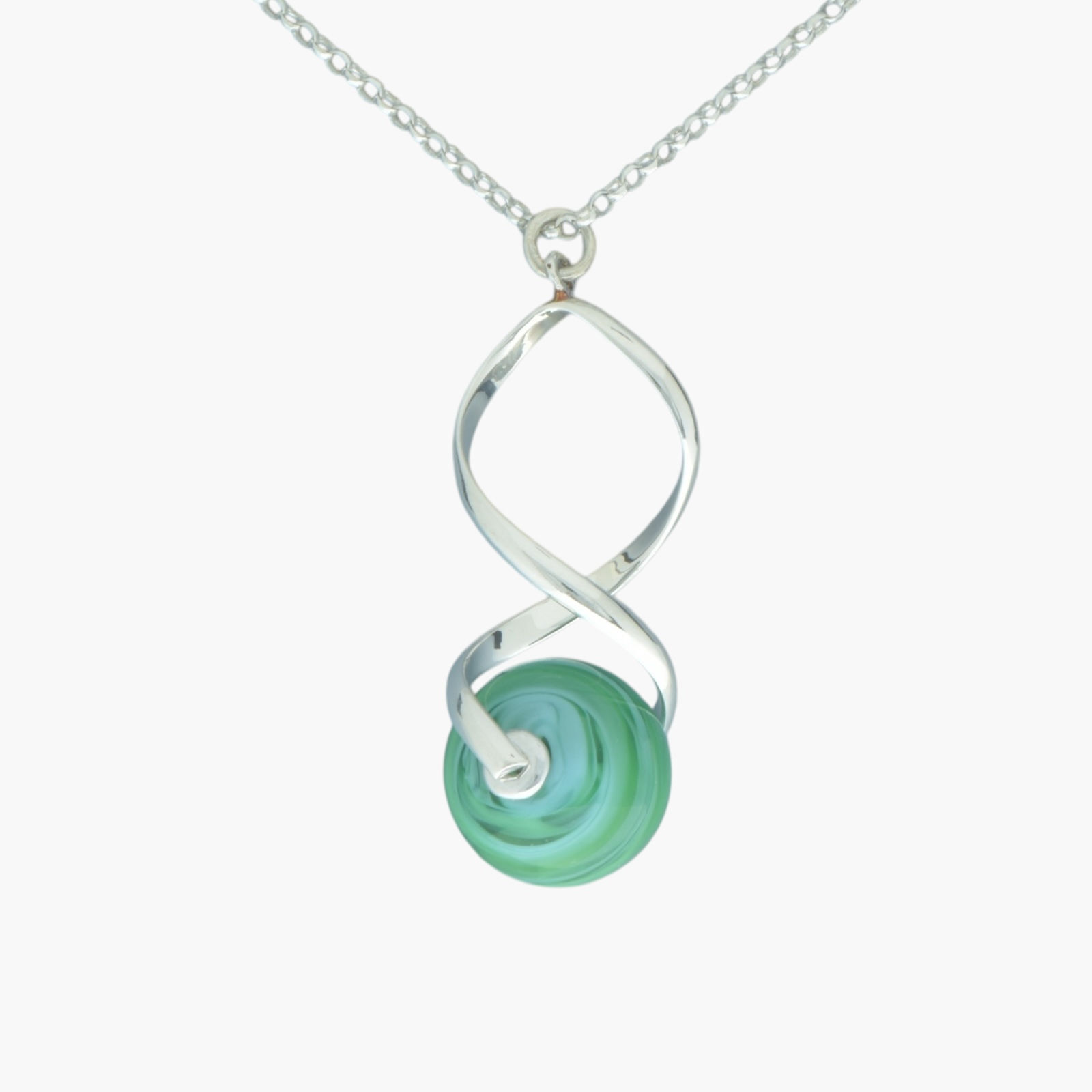 Ladies green sea spiral pendant on silver chain