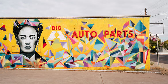Freida Kahlo mural on an auto parts garage