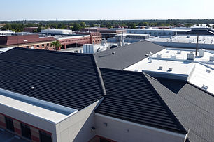 drone-images-commercial-roofs-featuring-tpo-asphalt-shingles-midday-sunny-no-people.jpg