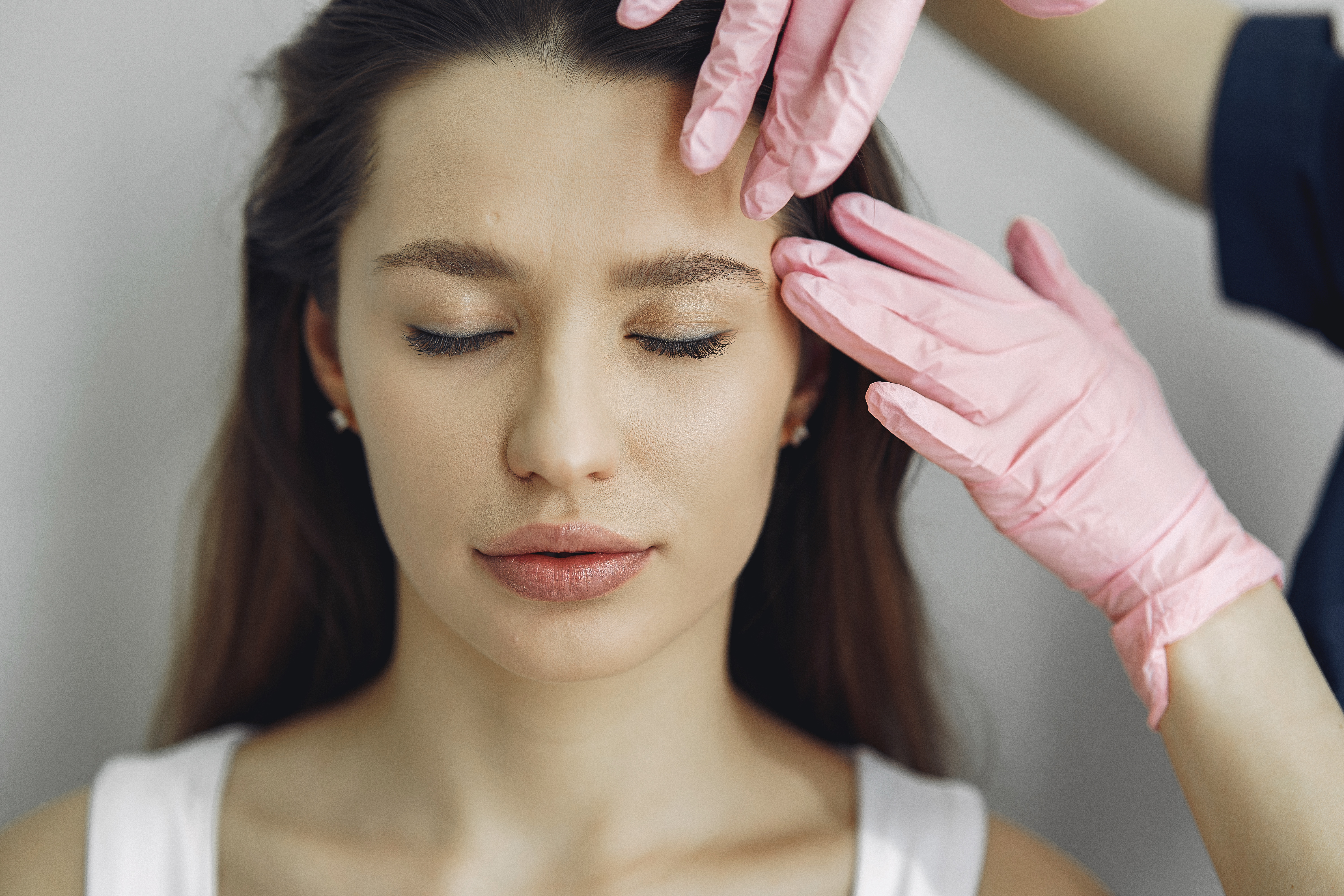 woman-with-doctor-cosmetology-studio.jpg