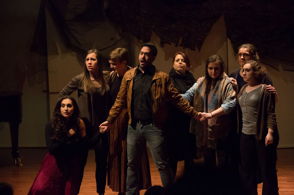 OperaWorks ensemble cast performing unified dramatic stage moment