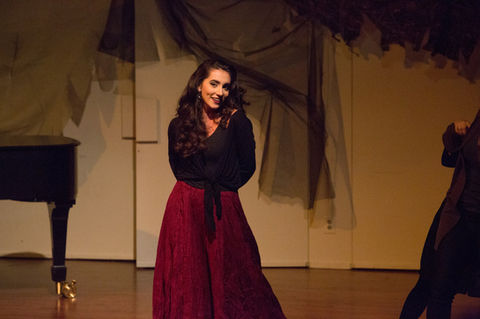 OperaWorks singer performing solo stage moment during production