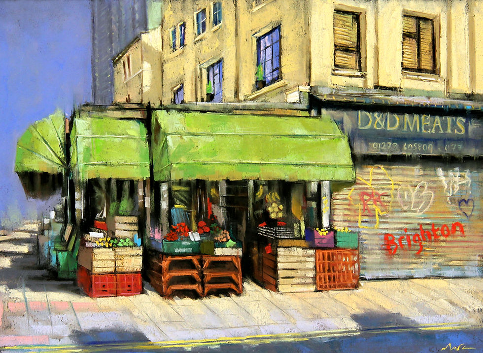 Early morning view of Kemp Town with pastel buildings and soft light.