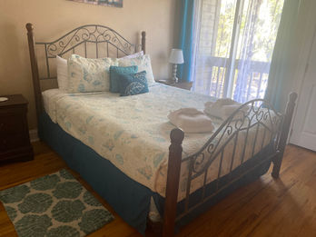 Pristine bedroom setup in Airbnb property post-expert cleaning by our professional team.