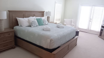 Pristine bedroom setup in Airbnb property post-expert cleaning by our professional team.