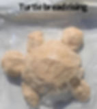 Unbaked turtle-shaped bread dough, representing baking and creative kitchen projects by individuals with autism.