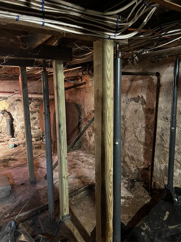 Basement remodel with foundational improvements and post installations by TB7 Home Remodeling in Brewster, NY.