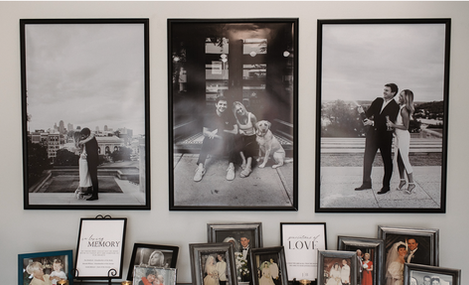The Maverick Three black-and-white framed photos on a wall.