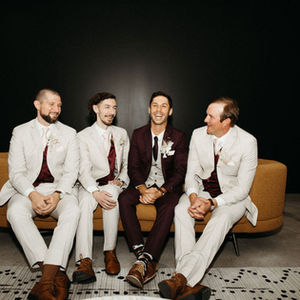 The Maverick Groomsman and Groom in cocktail lounge