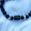 Thumbnail: Black & Silver Libra Zodiak necklace (close up/other side)