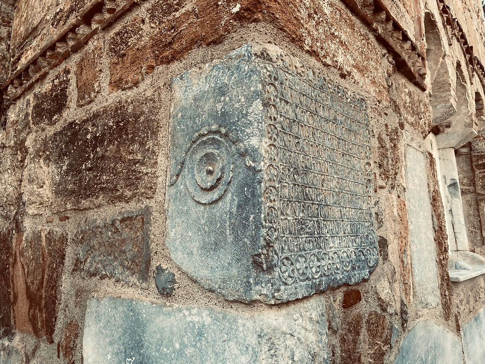 Ancient cornerstone repurposed in a historic wall