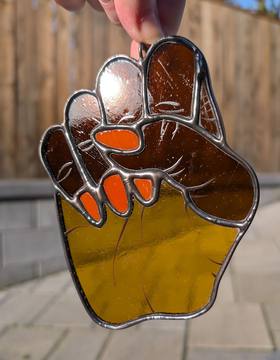 Thumbnail: "Fists Up" suncatchers