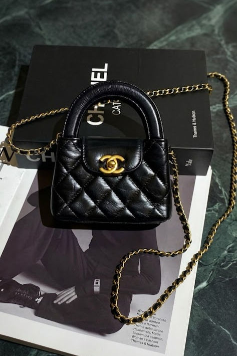 Chanel Shiny Aged Calfskin Quilted Mini Nano Kelly Shopper in black
