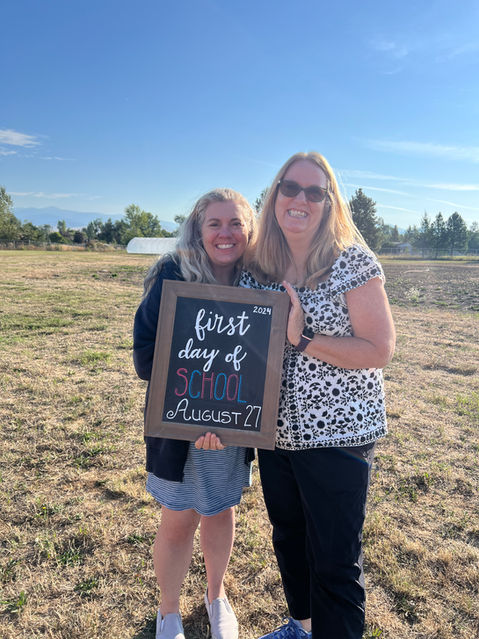 Picture of teachers holding sign