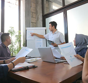 Person giving a presentation to colleg