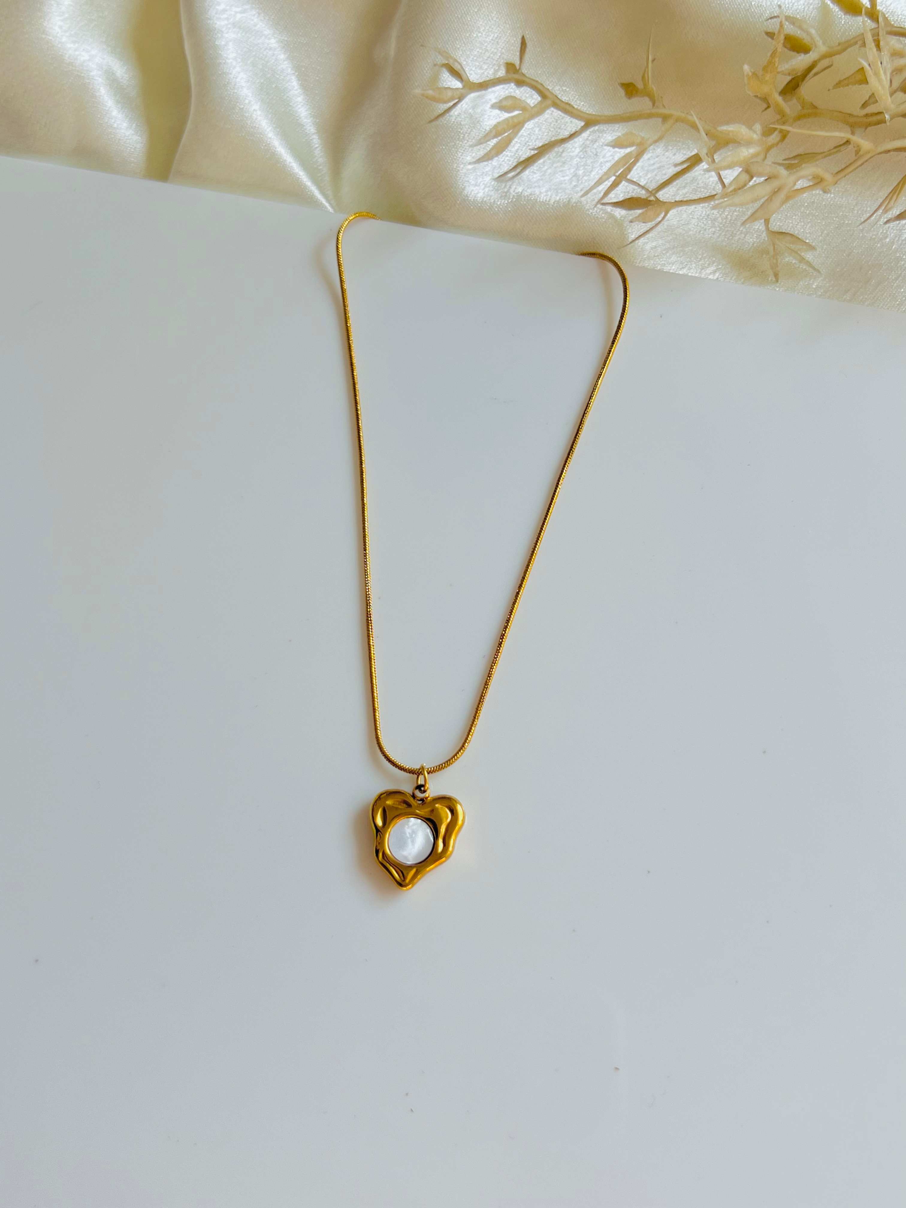 Molten heart pendant necklace 