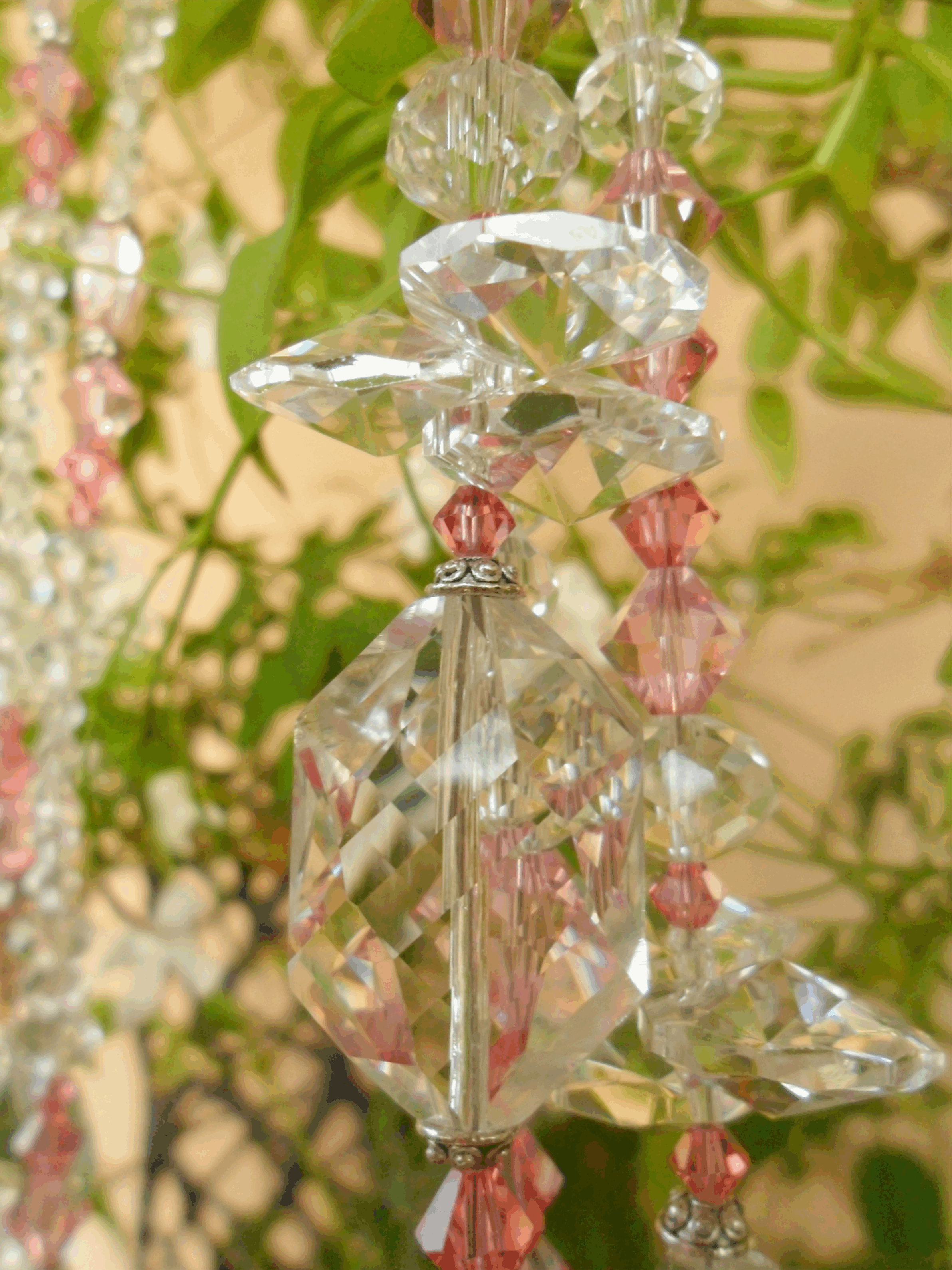 Swarovskie pink and clear crystal Mini-Light-Catchers.gif