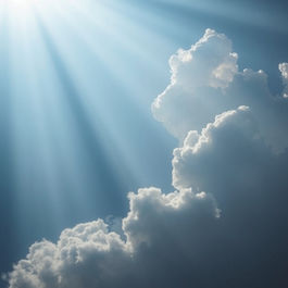 spiritual signs from loved ones in heaven, light shining through clouds symbolizing connection and guidance from spirit