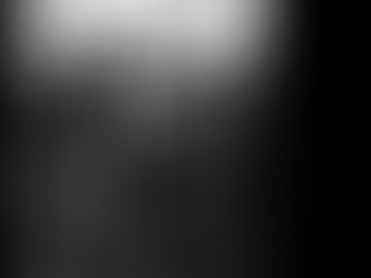 Silhouette of a traveler standing in an airport terminal beside a suitcase, looking through large windows toward an aircraft outside, reflective travel scene.