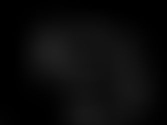 Black and white urban reflection photography featuring Gary PWK holding a camera, layered reflections, and a blurred subject entering the frame, representing fragmented perception and quiet observation.