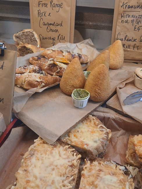 A selection of arancini and deluxe toasted sandwiches  at Arcade Deli, Buxton