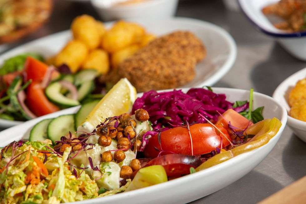 A selection of colourful salads and healthy hot meals at the Biome cafe, Eden Project