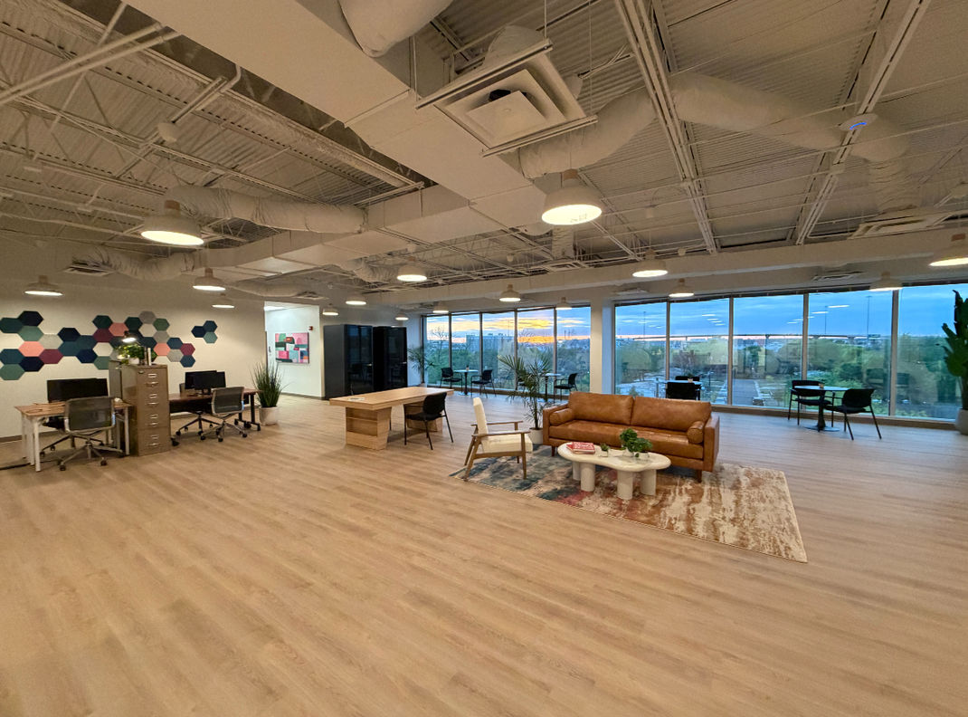 Large open space for custom event setup with large windows and beautiful sunsets.