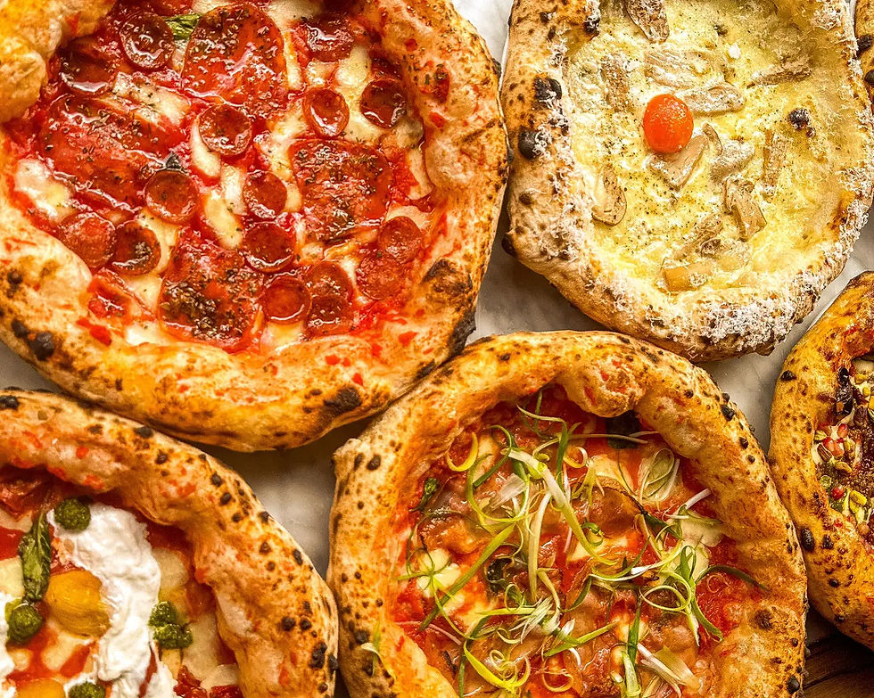 Selection of Crust Bros wood-fired Neapolitan pizzas.