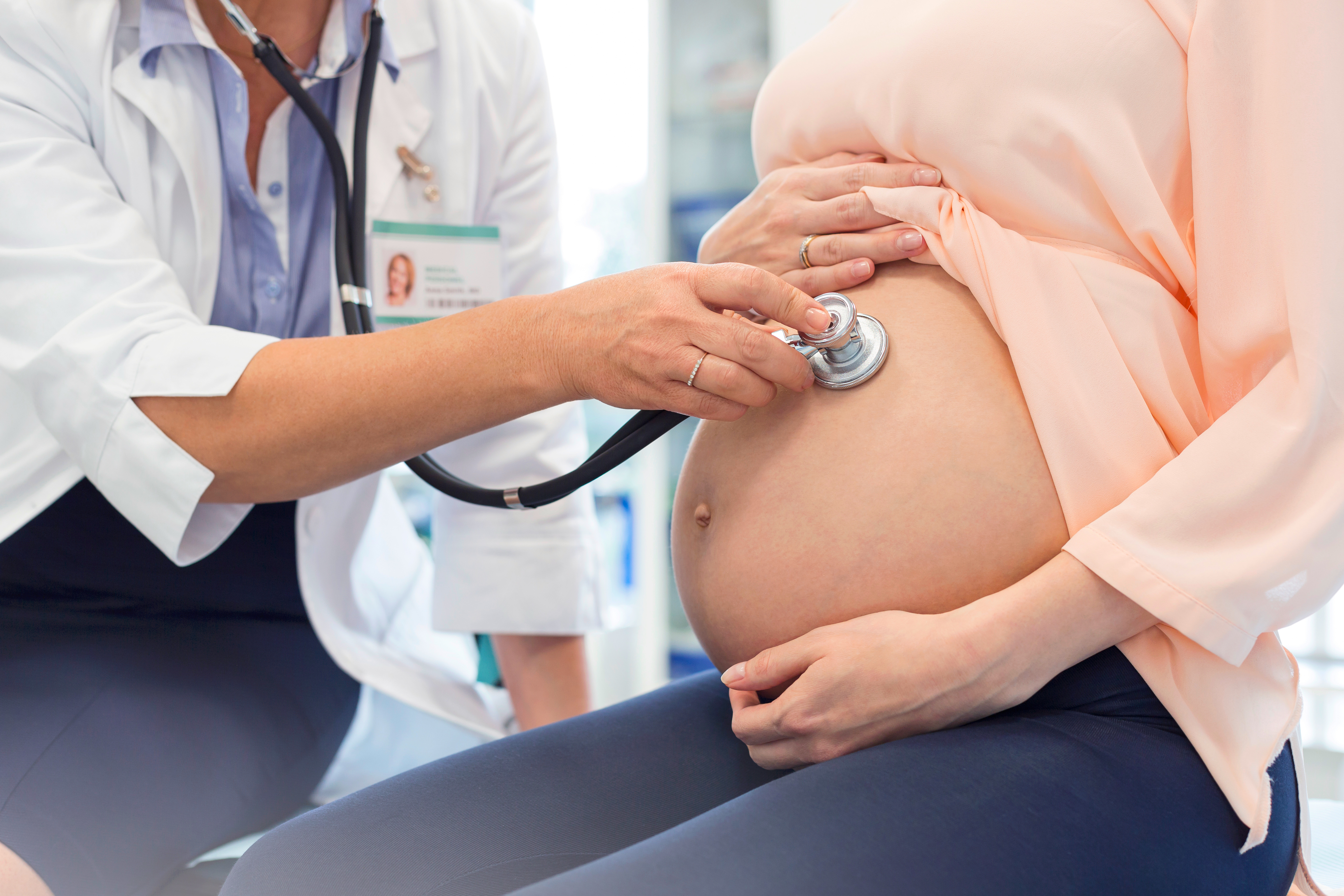 pregnant woman being checked by doctor - zero waste pregnancy