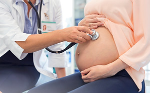 Doctor Examining Pregnant Woman