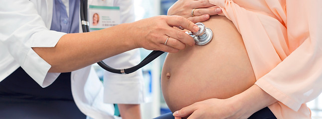 Doctor Examining Pregnant Woman
