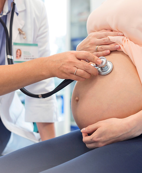 Doctor Examining Pregnant Woman