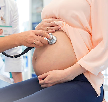 Doctor Examining Pregnant Woman