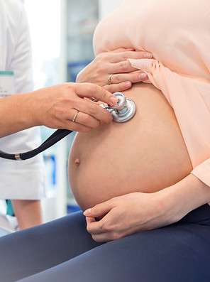 Doctor Examining Pregnant Woman