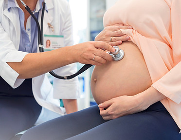 Doctor Examining Pregnant Woman