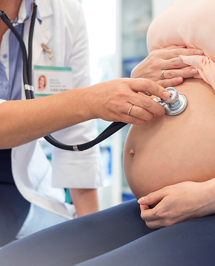 Doctor Examining Pregnant Woman