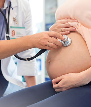 Doctor Examining Pregnant Woman