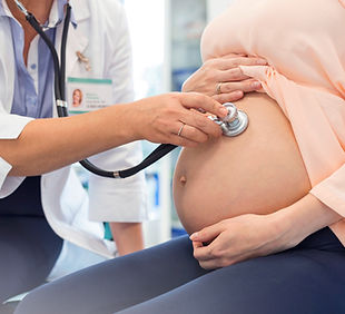 Doctor Examining Pregnant Woman