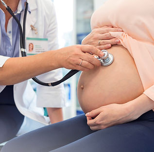 Doctor Examining Pregnant Woman